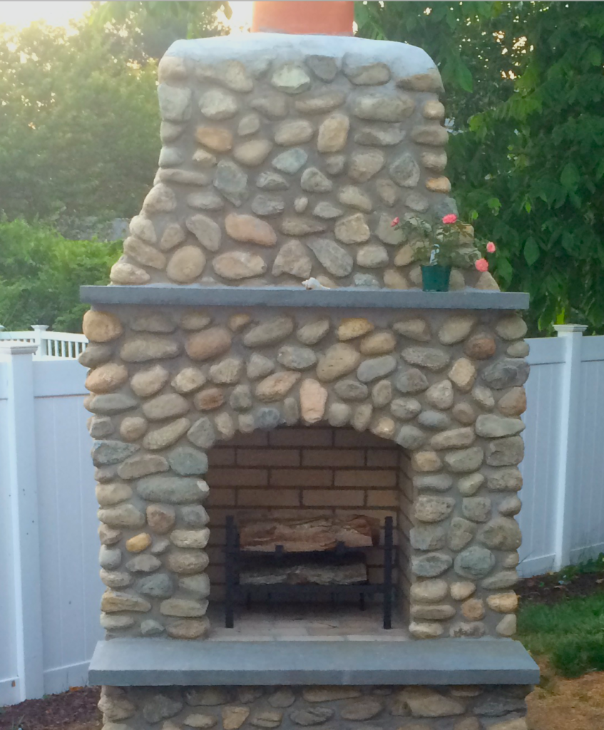 Choosing a log grate for an outdoor fireplace.